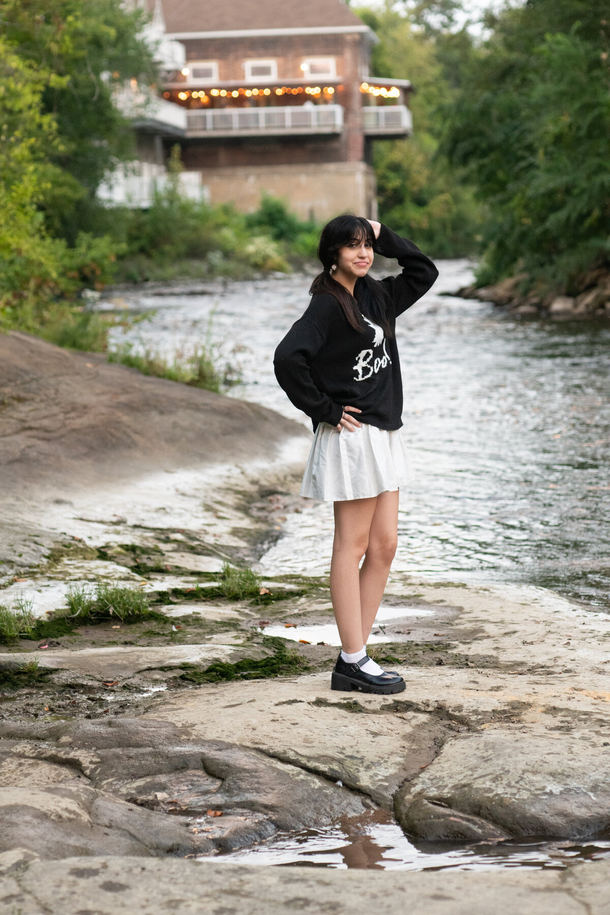 teenage girl by the river in Cuyahoga Falls