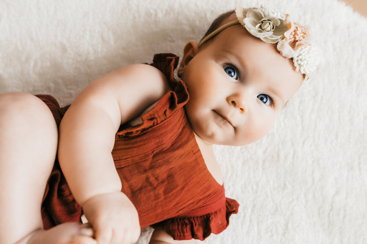 6 month session of baby girl with floral headband by harrisburg pa baby photographer