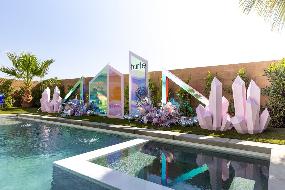 Tarte beauty activation by The Works Collective | custom poolside event installation in Palm Springs, California.
