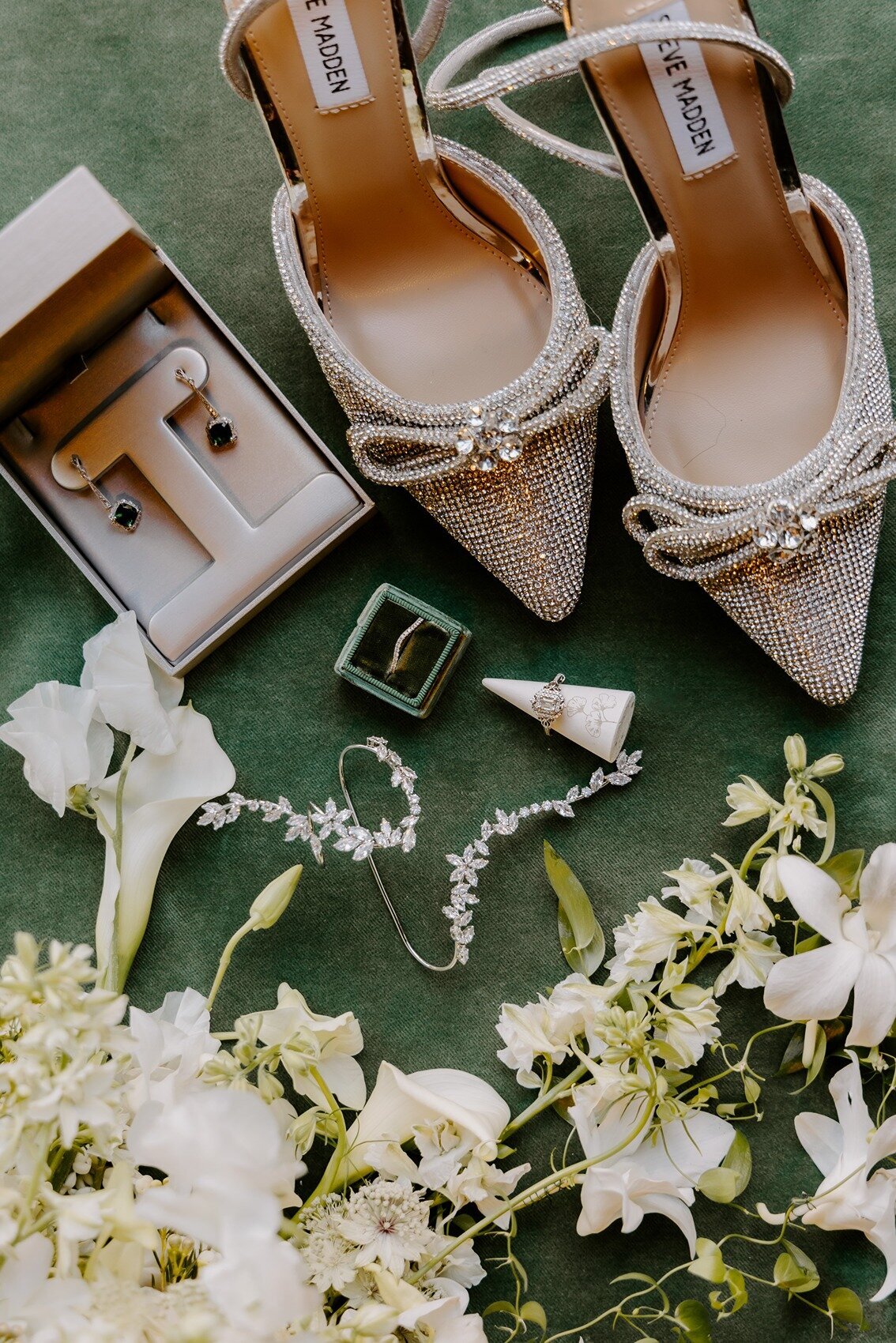 Flat lay of wedding details on the table
