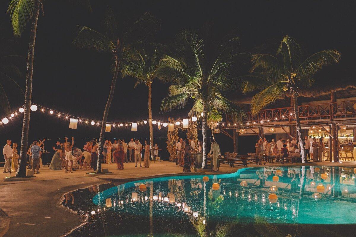 Wedding reception location with guests at night at viceroy riviera maya wedding