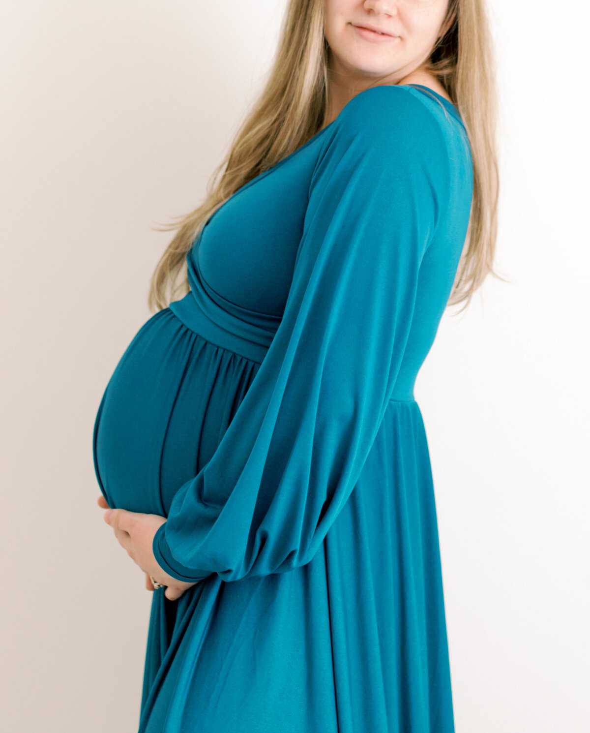 baby bump in studio taken by maternity photographers spokane