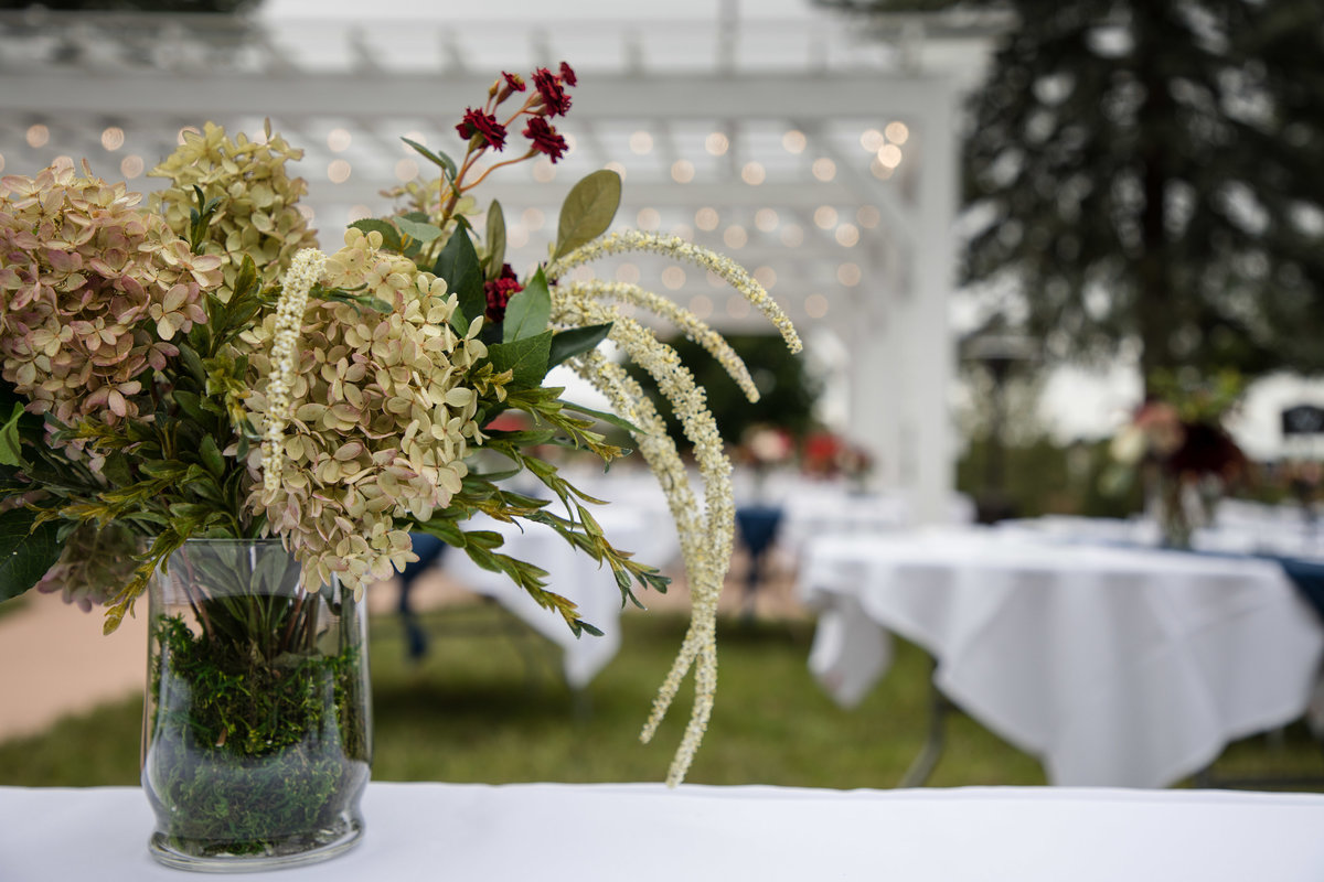 reception setup pic from behind centerpiece