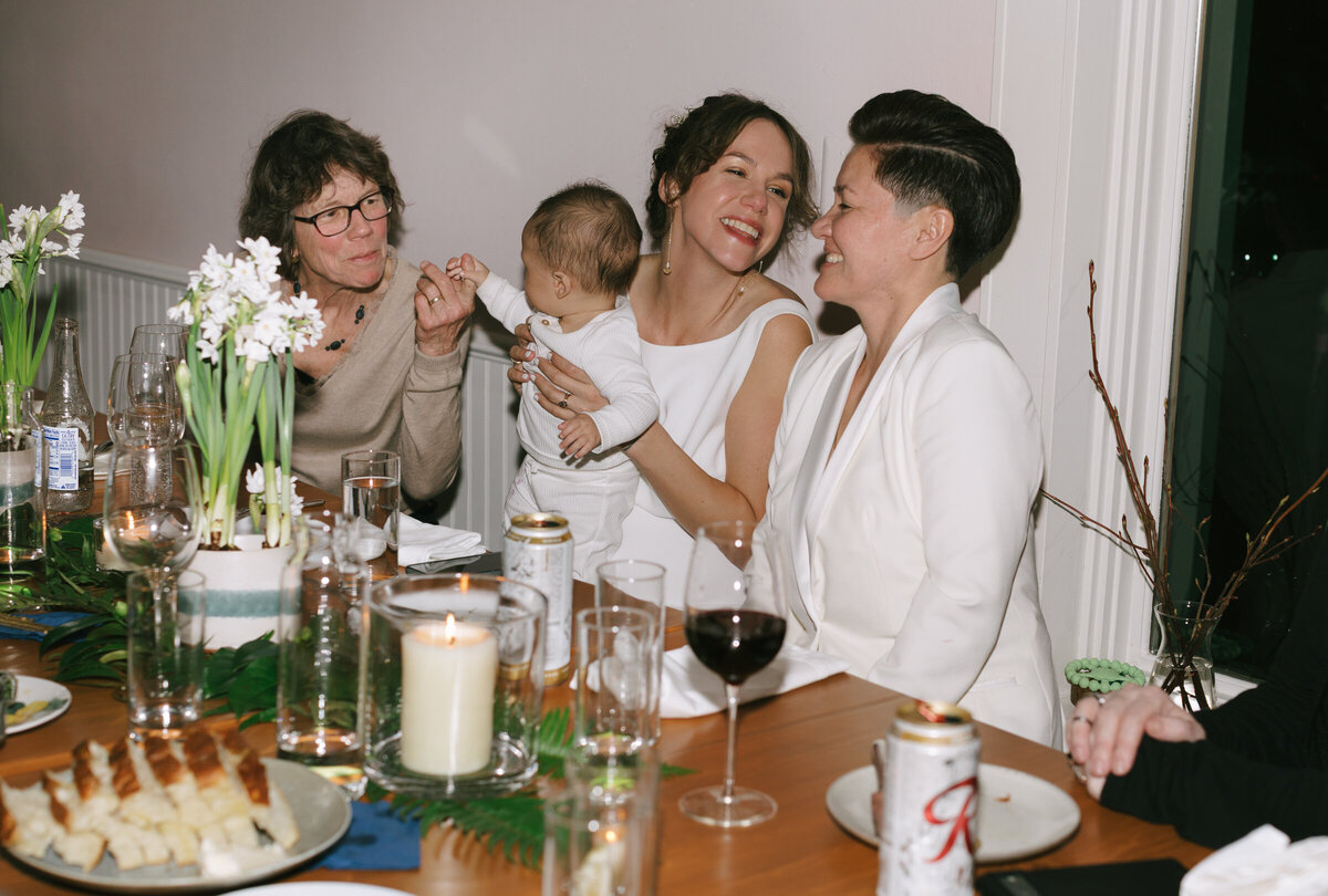 Photography of a couple celebrating LGBTQ love during an intimate wedding at Fairweather restaurant in Portland, Oregon. 