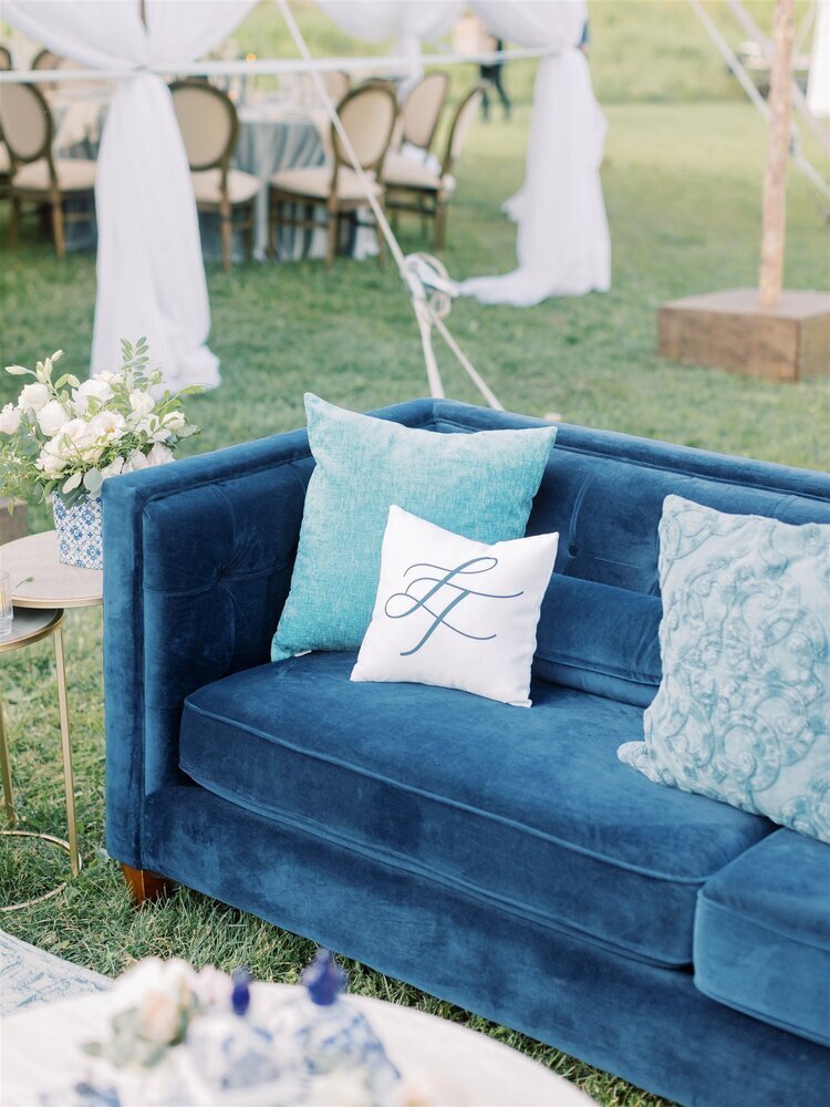 Blue couch at an outdoor wedding venue in Colorado