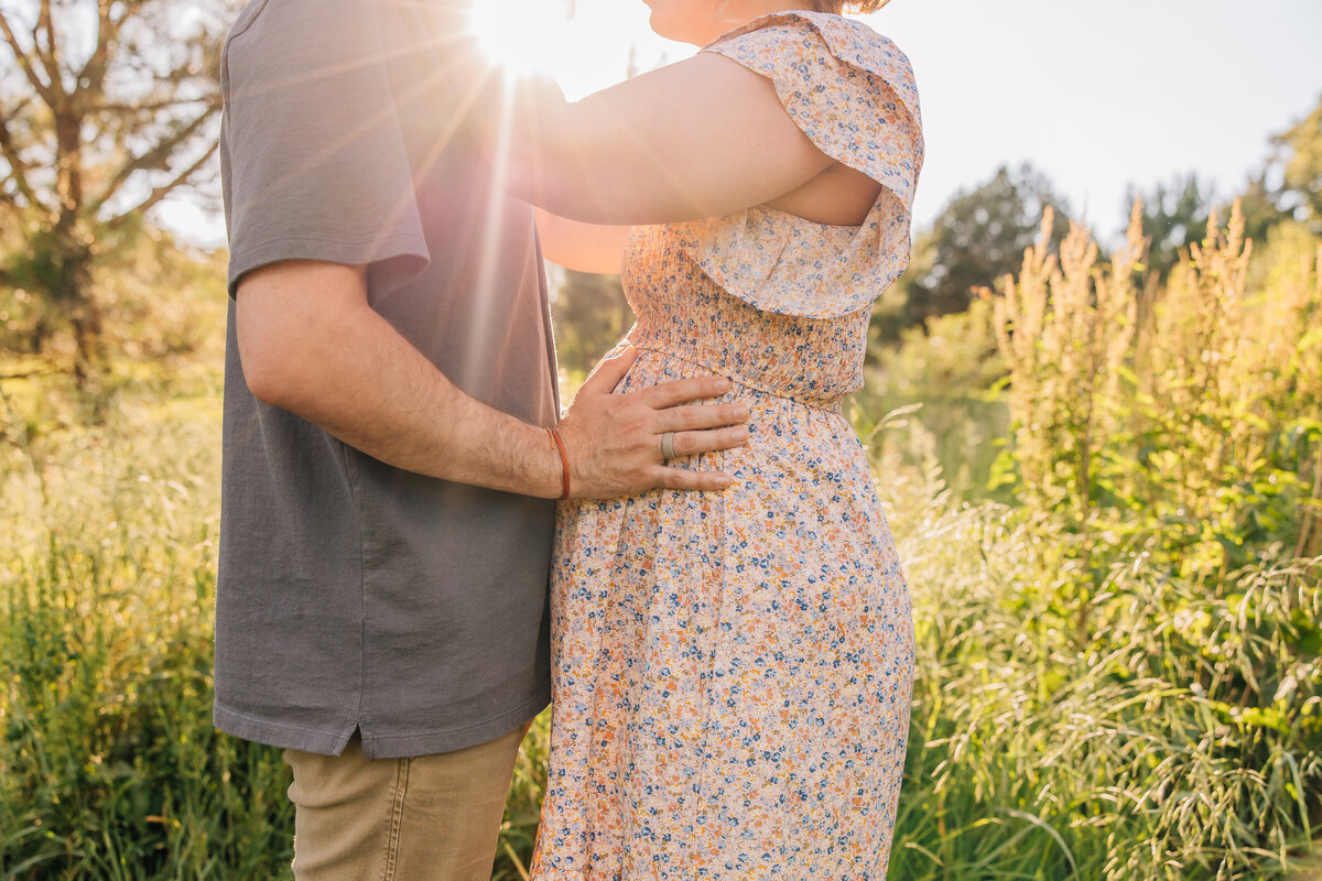 couple embracing in the sunlight