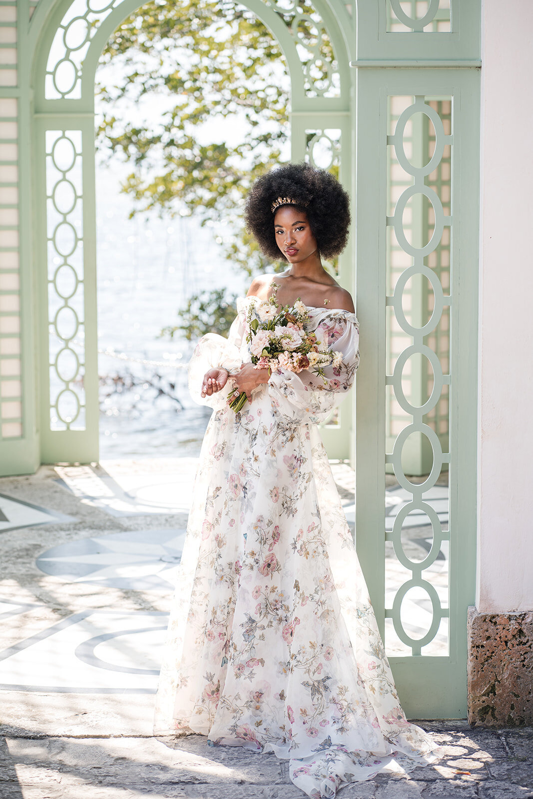 a bridal portrait of a woman in a floor length floral gown taken by columbus wedding photographer A James Visuals.