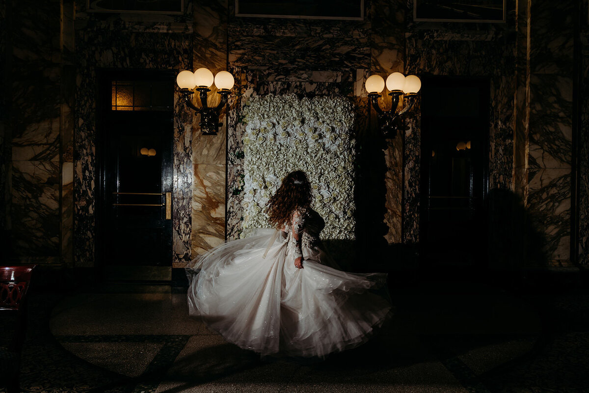 Bride twirls in her wedding gown