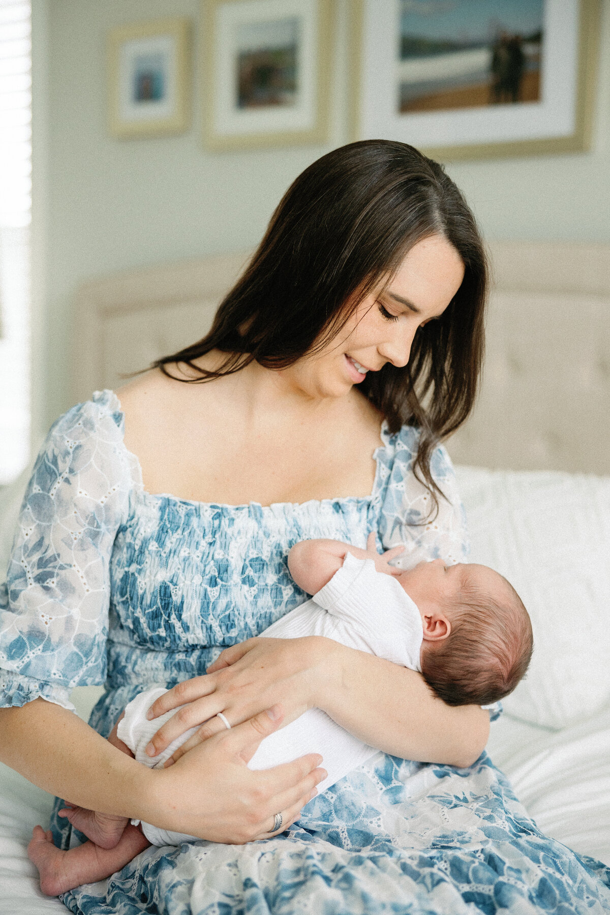 mother holding baby boy in her arms