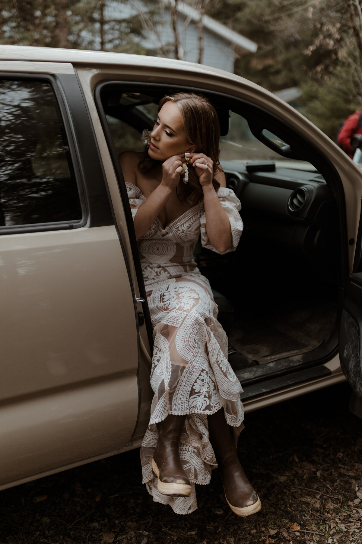bride sitting in car