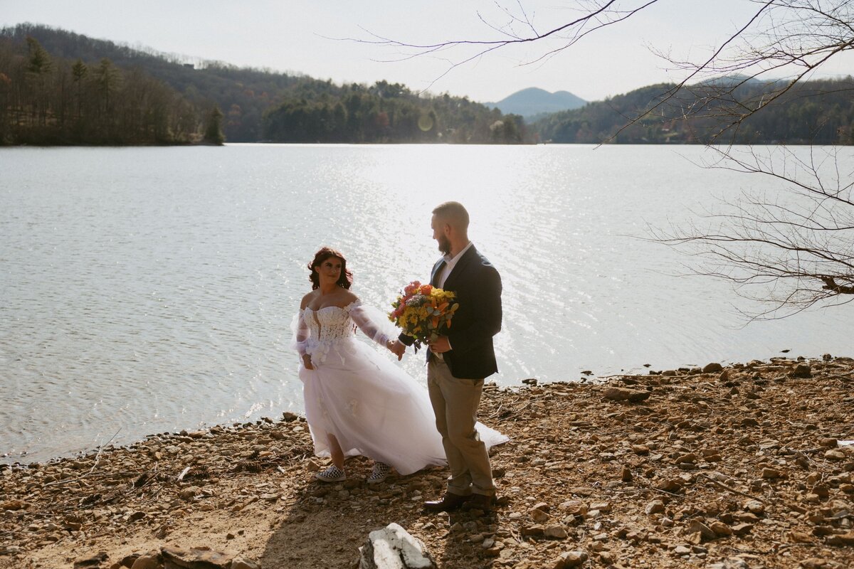 An adventurous couple eloping out west with their horse.
