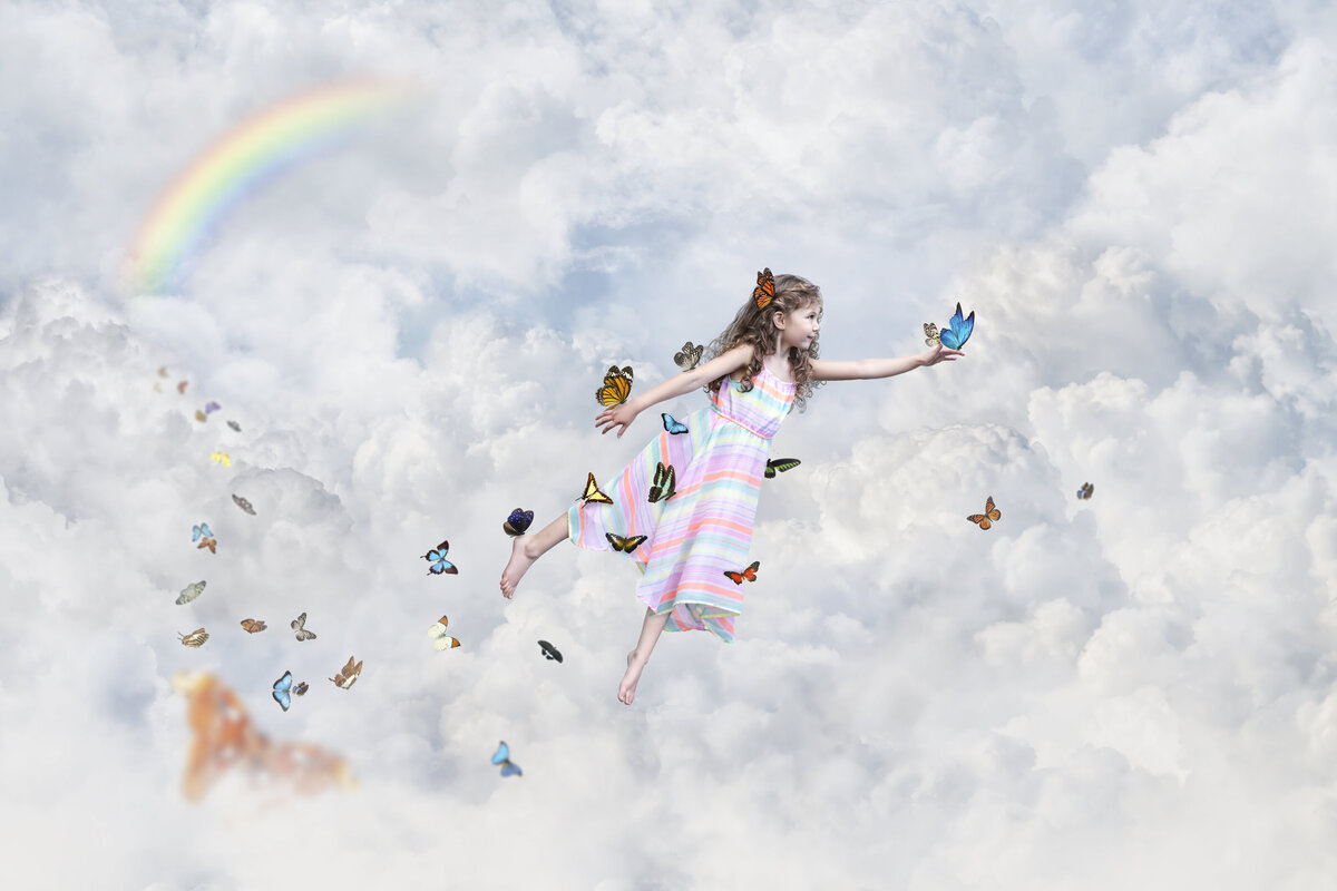 girl and butterflies flying