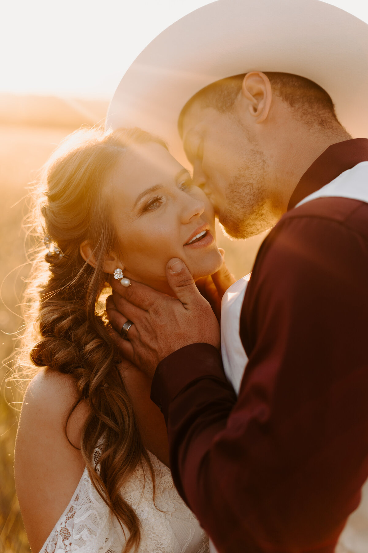 bride and groom kissing