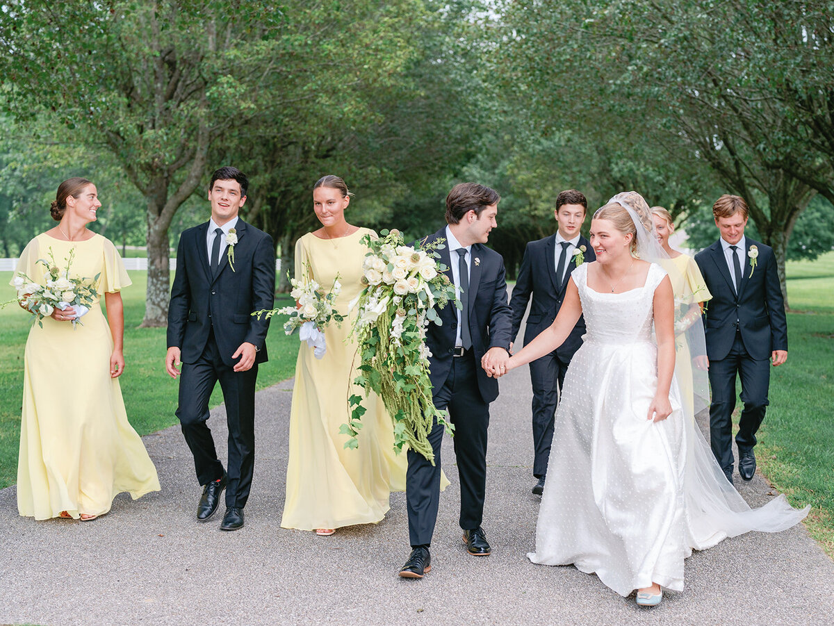 Wedding party pictures at at Passerine Hills Estate with the bridesmaids in yellow
