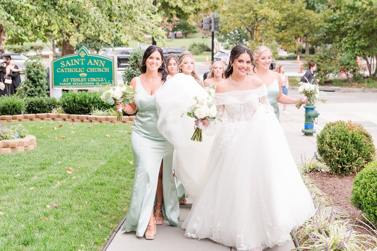 bridesmaids and bride walking