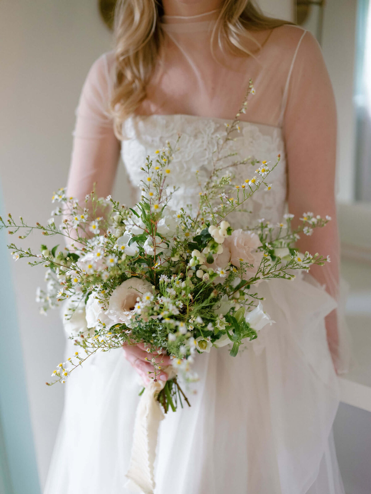 bride holding dreamy bouquet