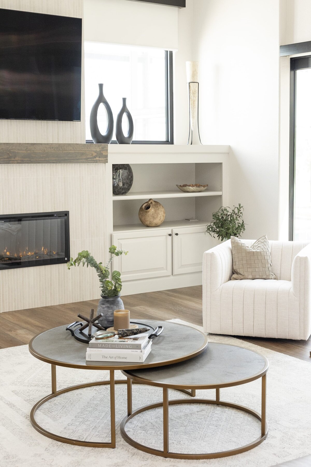 dewine design orlando interior designer windermere full home renovation living room with round coffee table and white chair