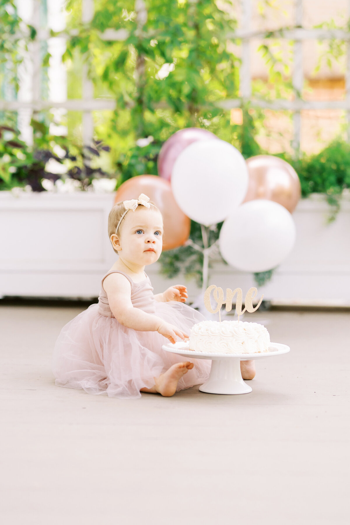 baby photographer near me cake smash first birthday studio