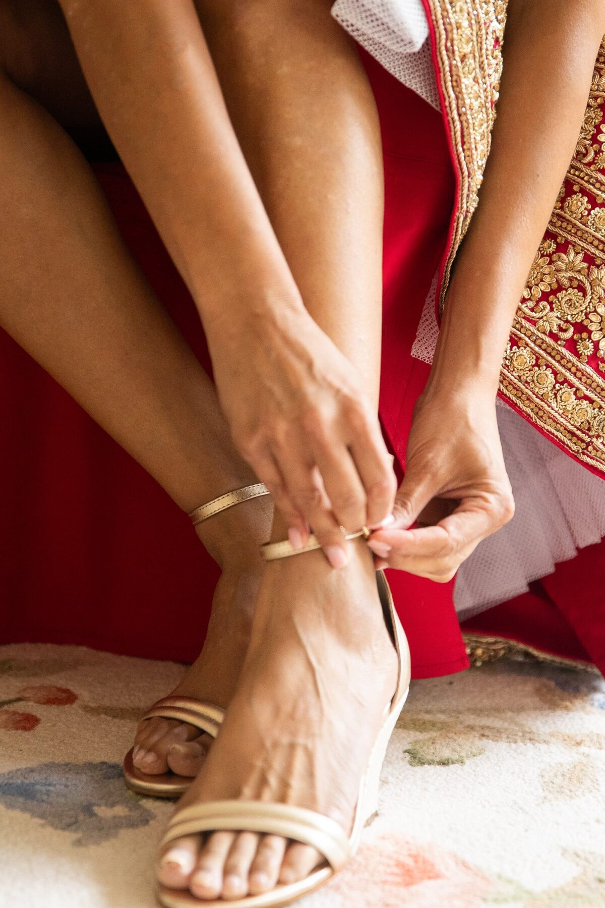 gold-wedding-shoes-red-sari-bride