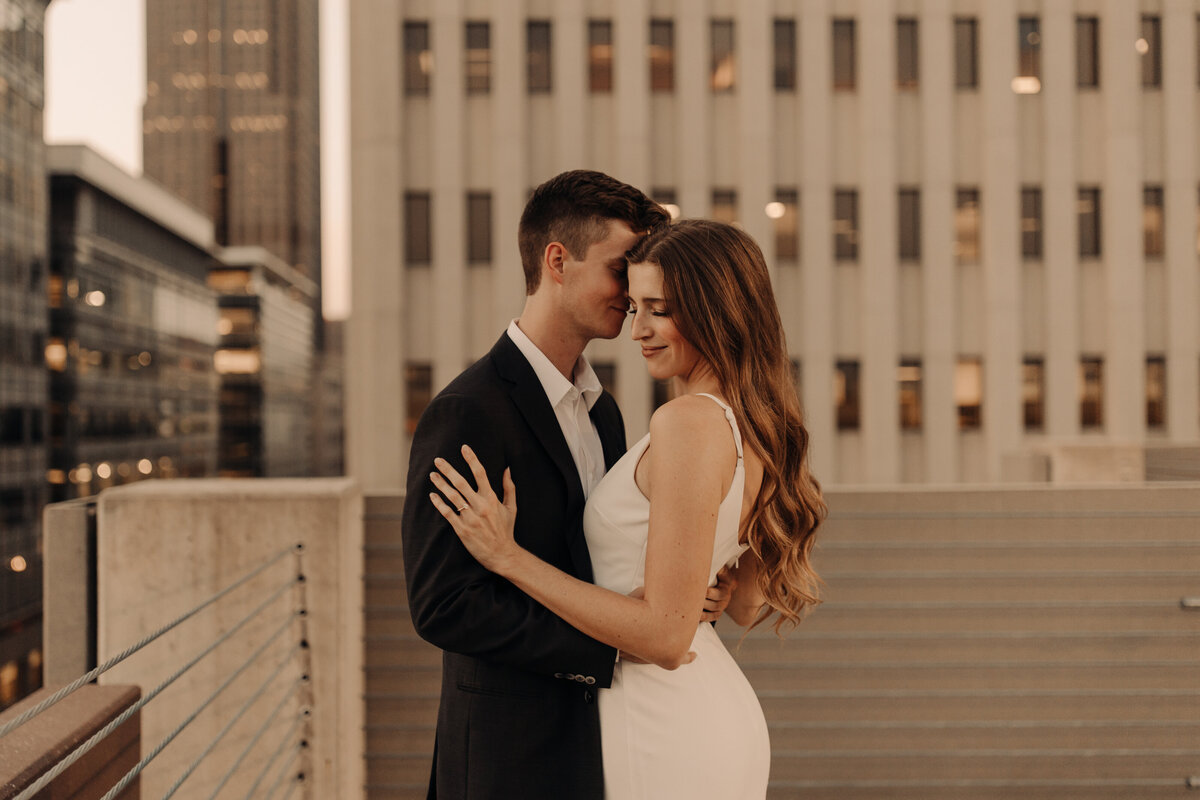 city engagement session on  top of a parking garage