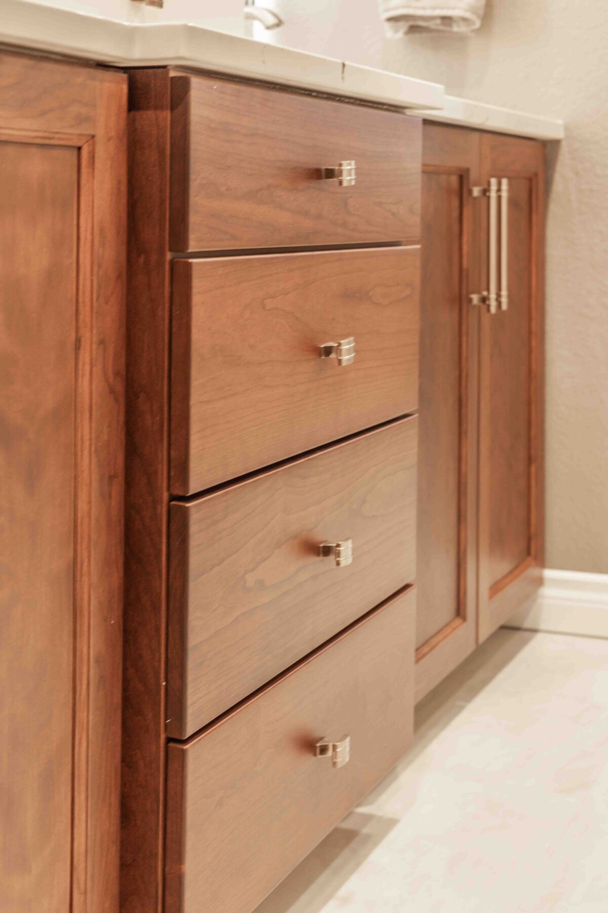 warm wood cabinets with brass accents