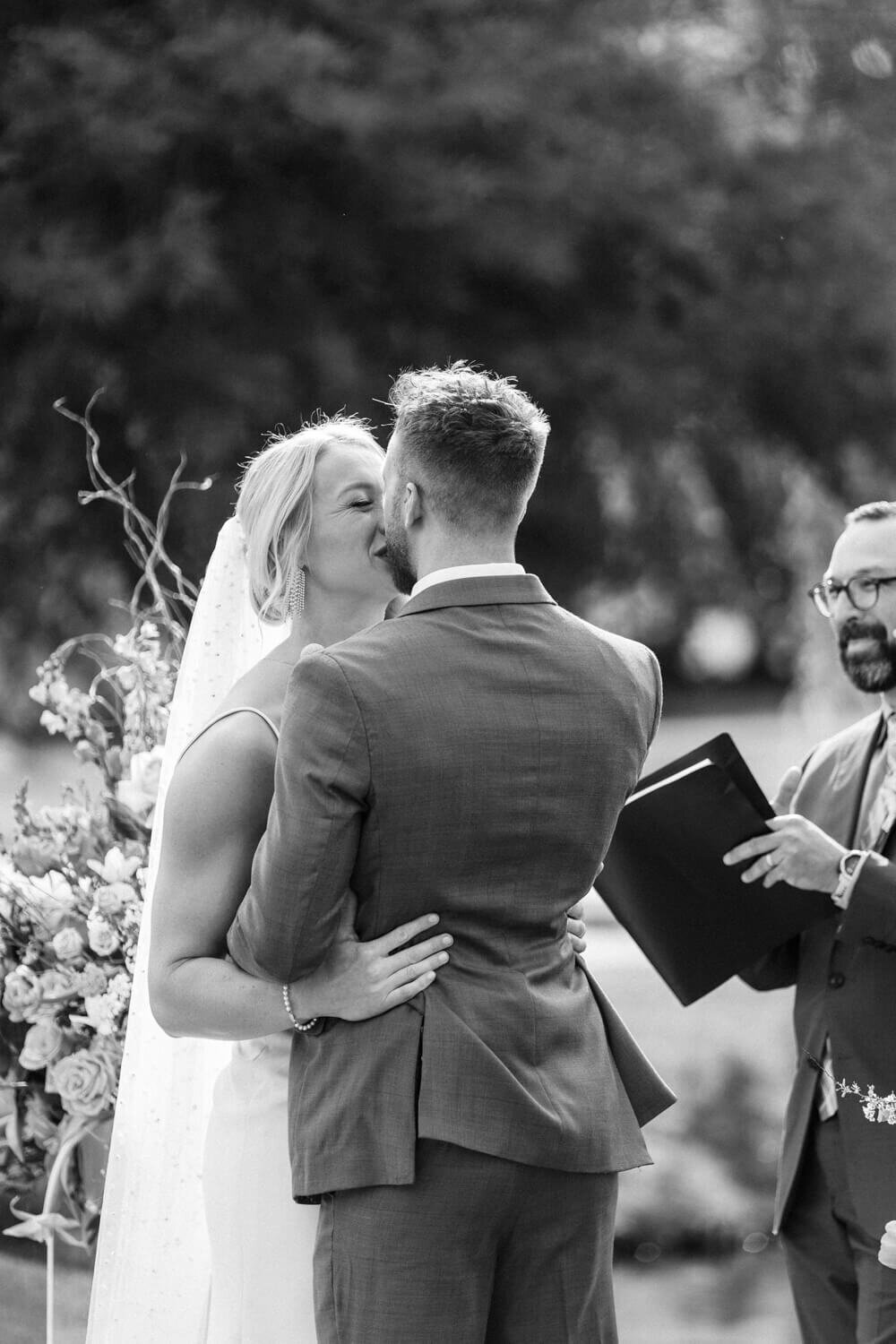 couples-first-kiss-while-smiling