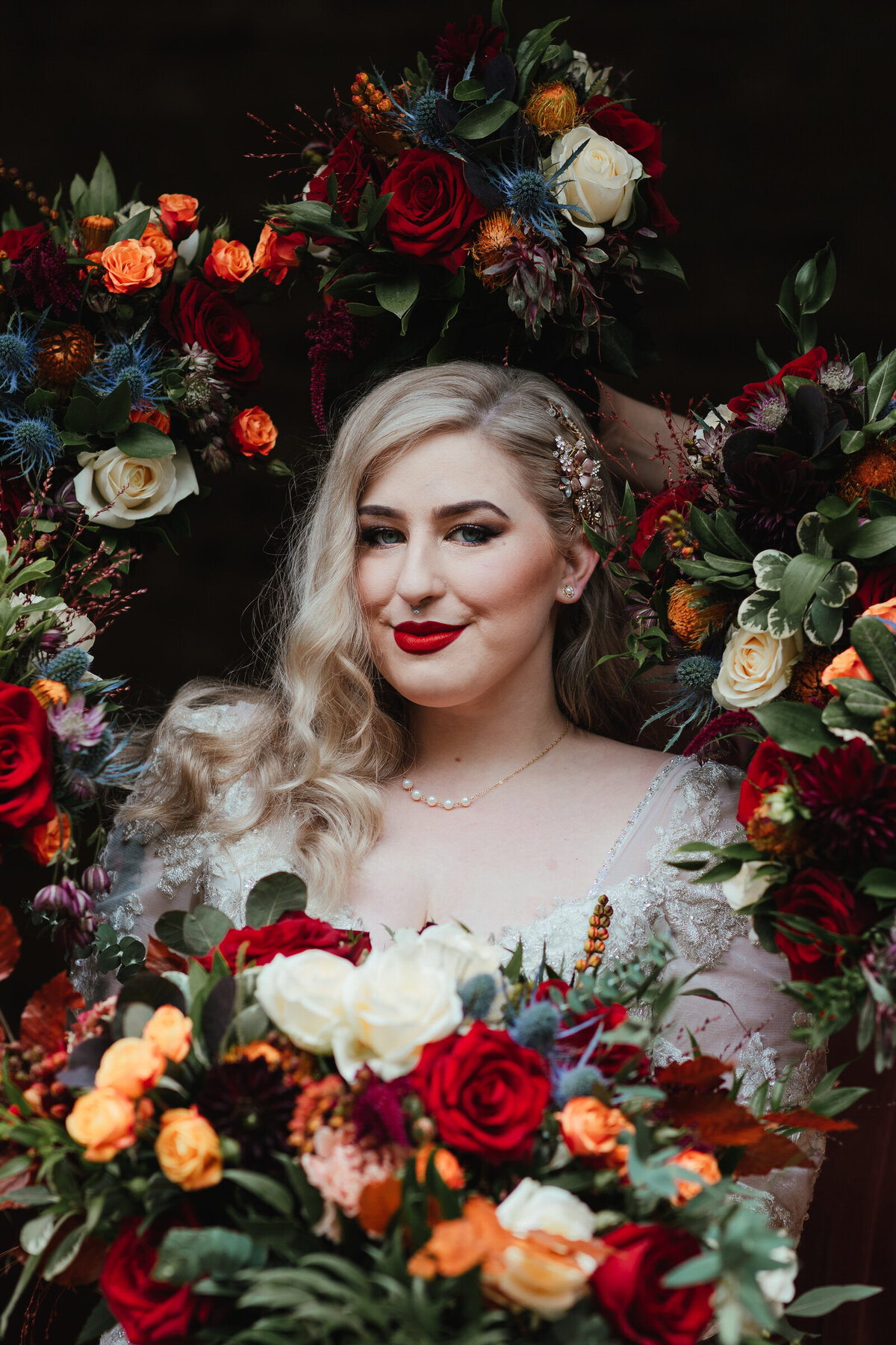 Bride surrounded by flowers