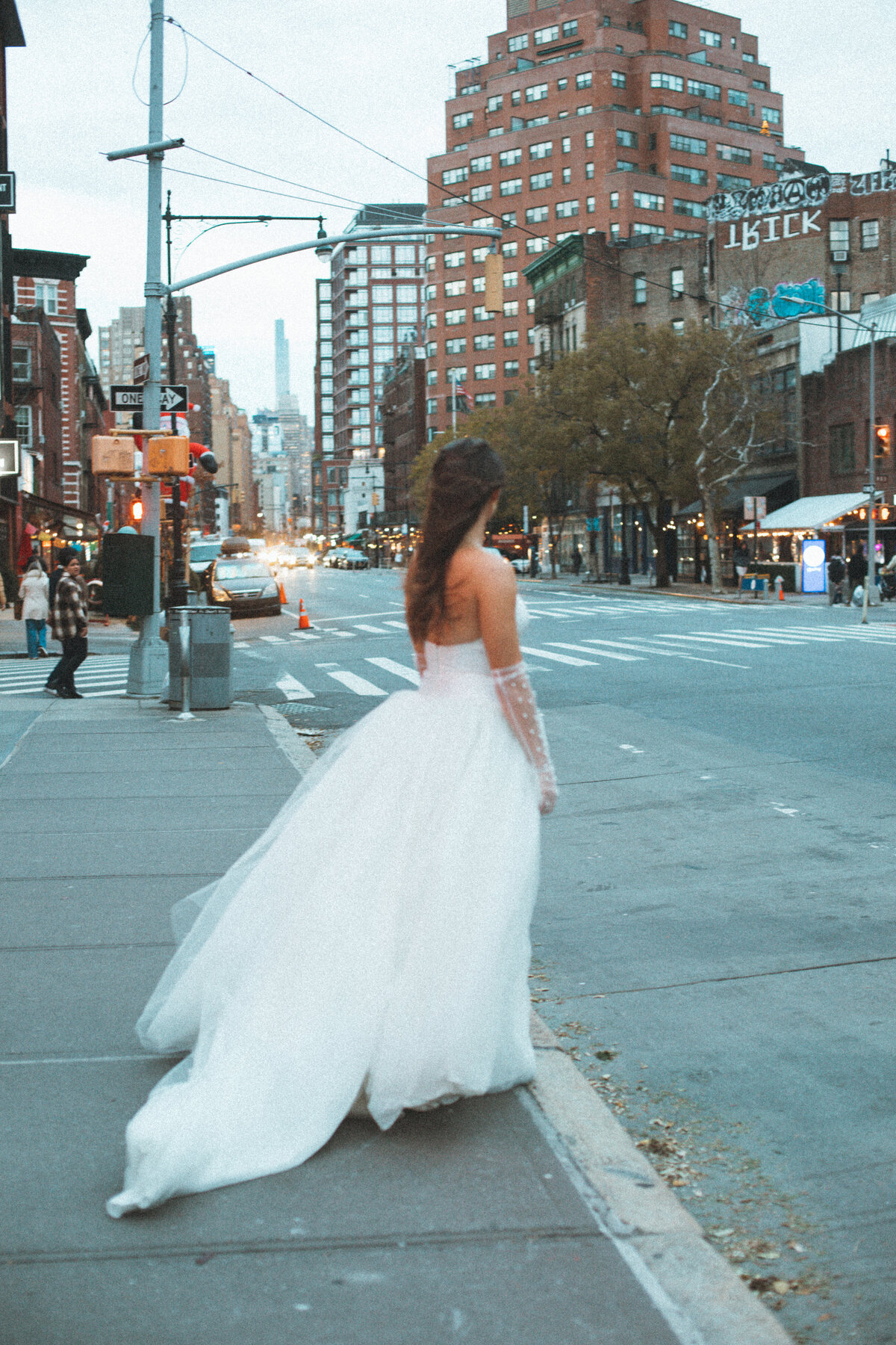 bride waiting for taxi in nyc