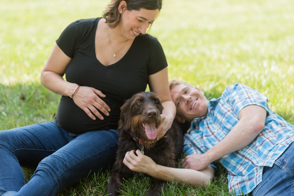 candid expectant couple with dog-1
