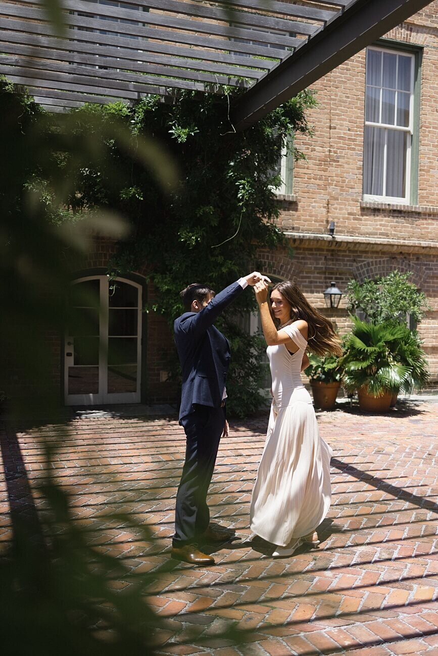 Couple dancing under pergola at Hotel Peter and Paul