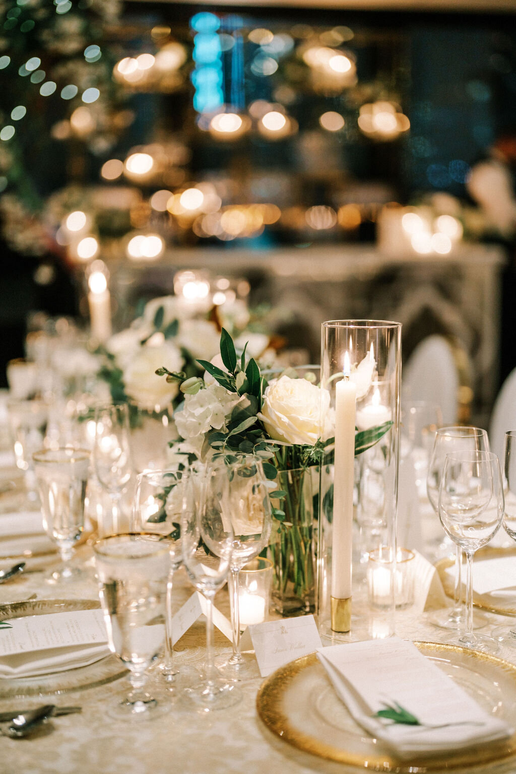 Close up of the decorated table of candles and flowers. 