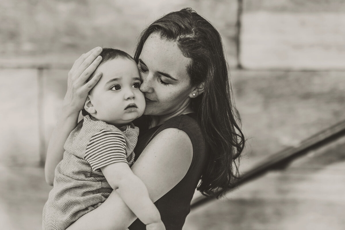 black-white-mom-holding-toddler