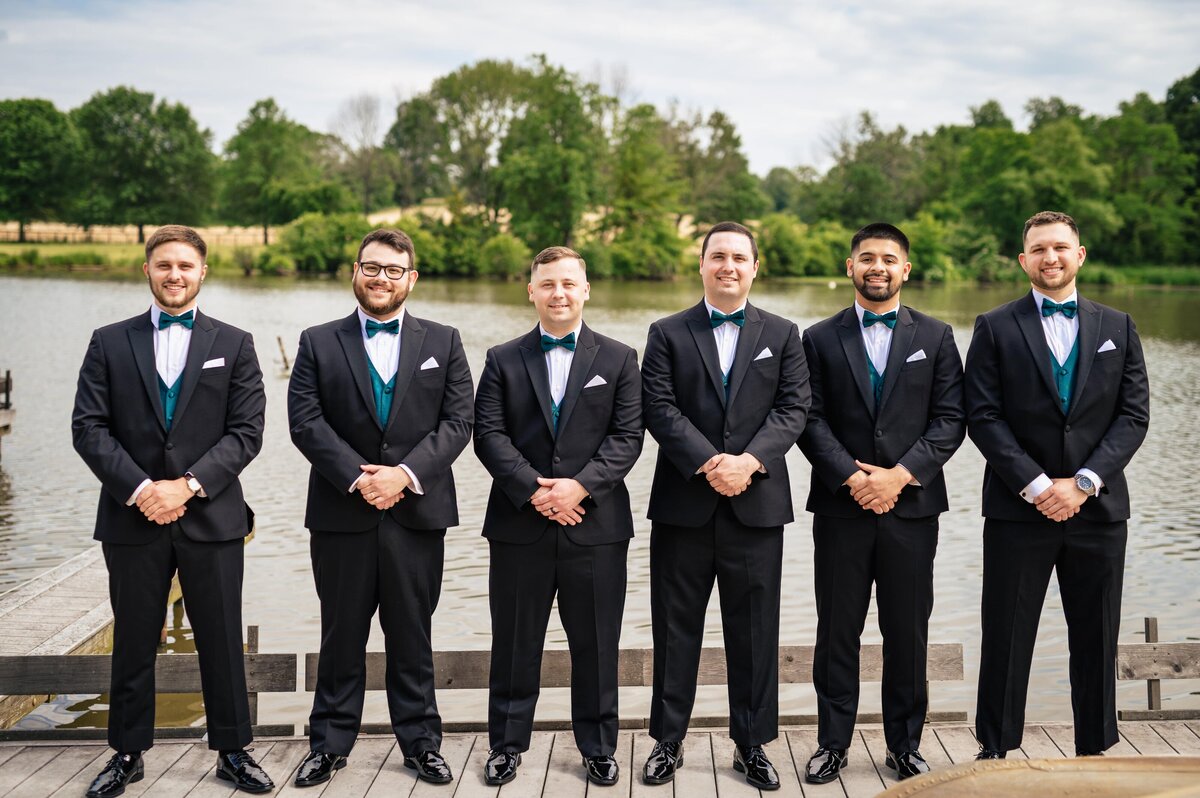 Black Groom  & Groomsmen Suit with Green Vest and Bow