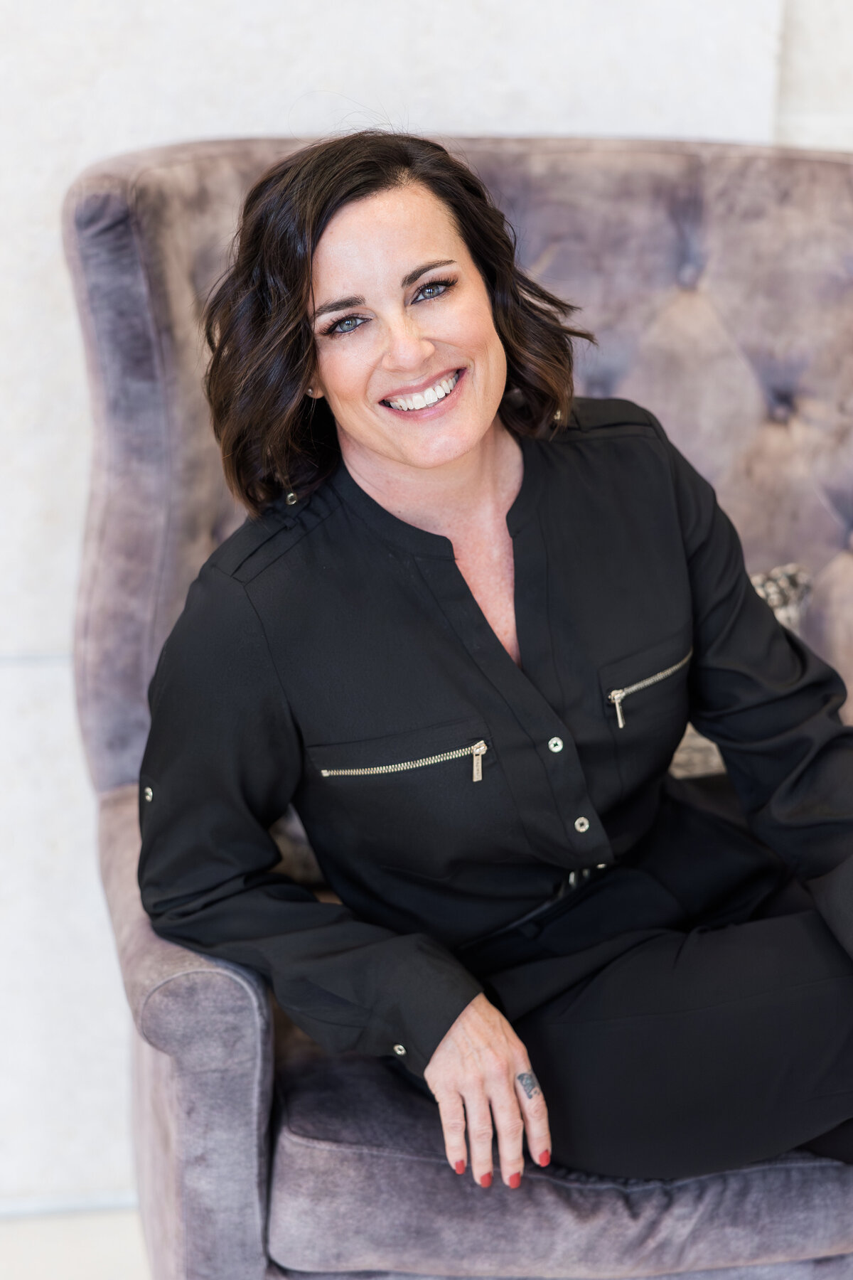 personal-branding-photo-shoot-realtor-sitting-in-chair
