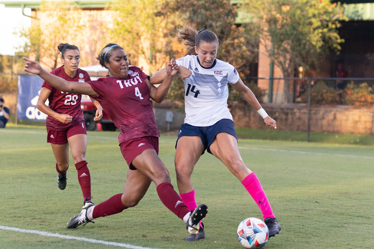 Claudia Guiterrez passes the ball during a match against Troy University at The Cage in Mobile, Alabama.