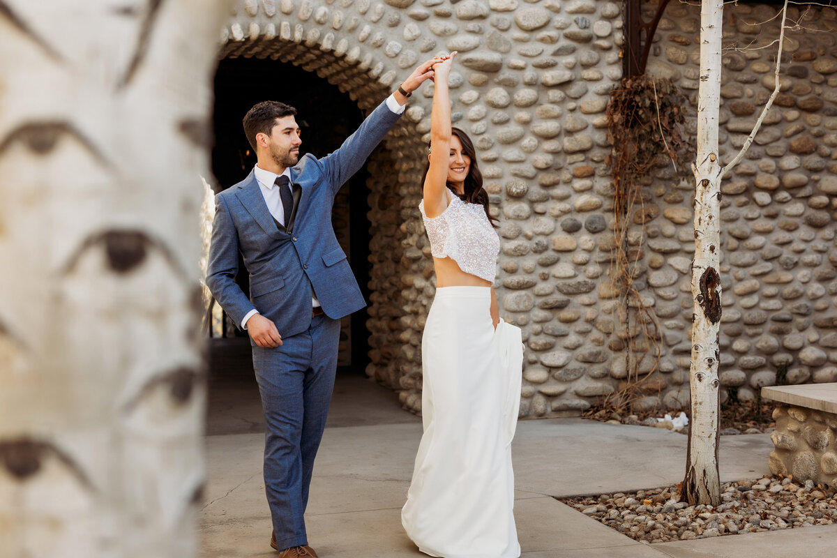Groom twirls wife during first look at Surf Hotel