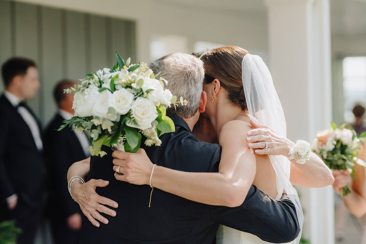 Bride hugging father at Canandaigua Country Club, NY