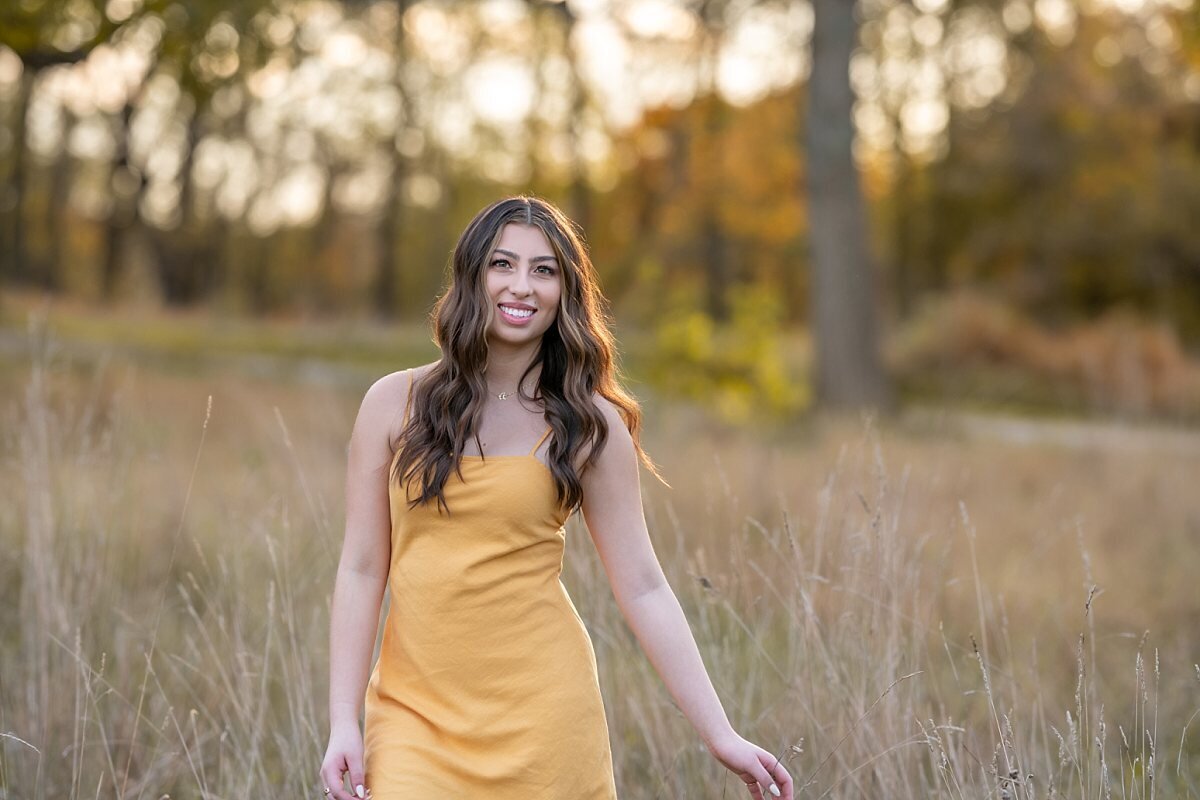 smiling-Tuscarora-senior-wearing-yellow