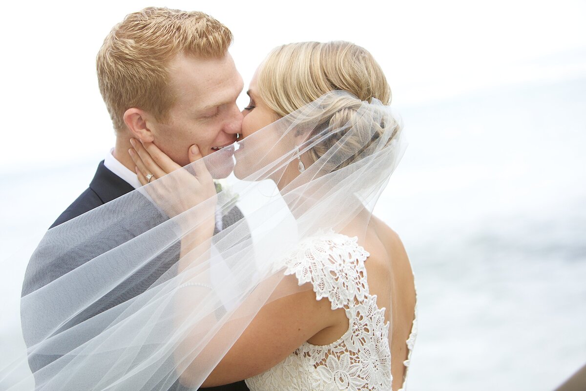Bride and Groom embracing  in black and white