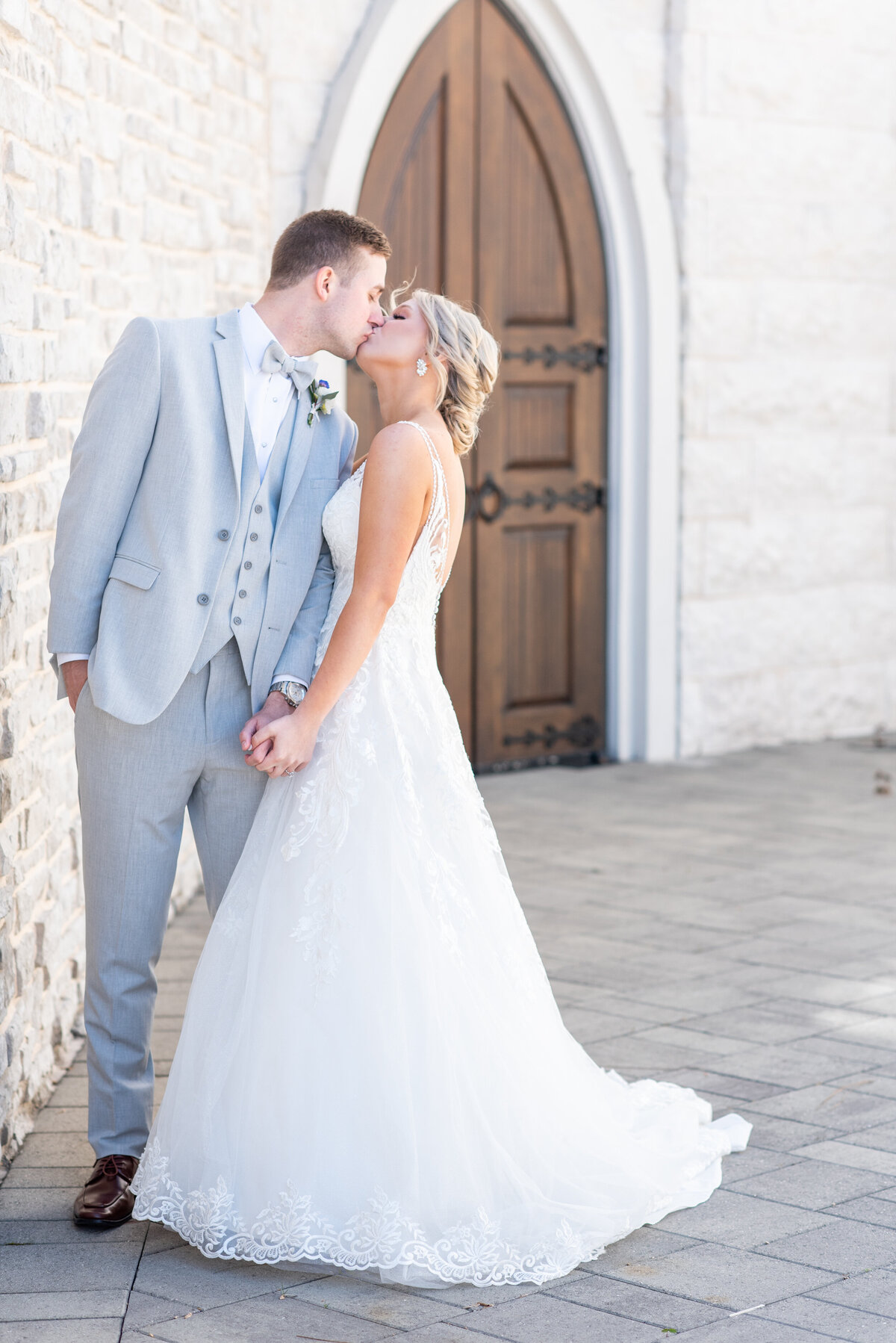 bride and groom kissing