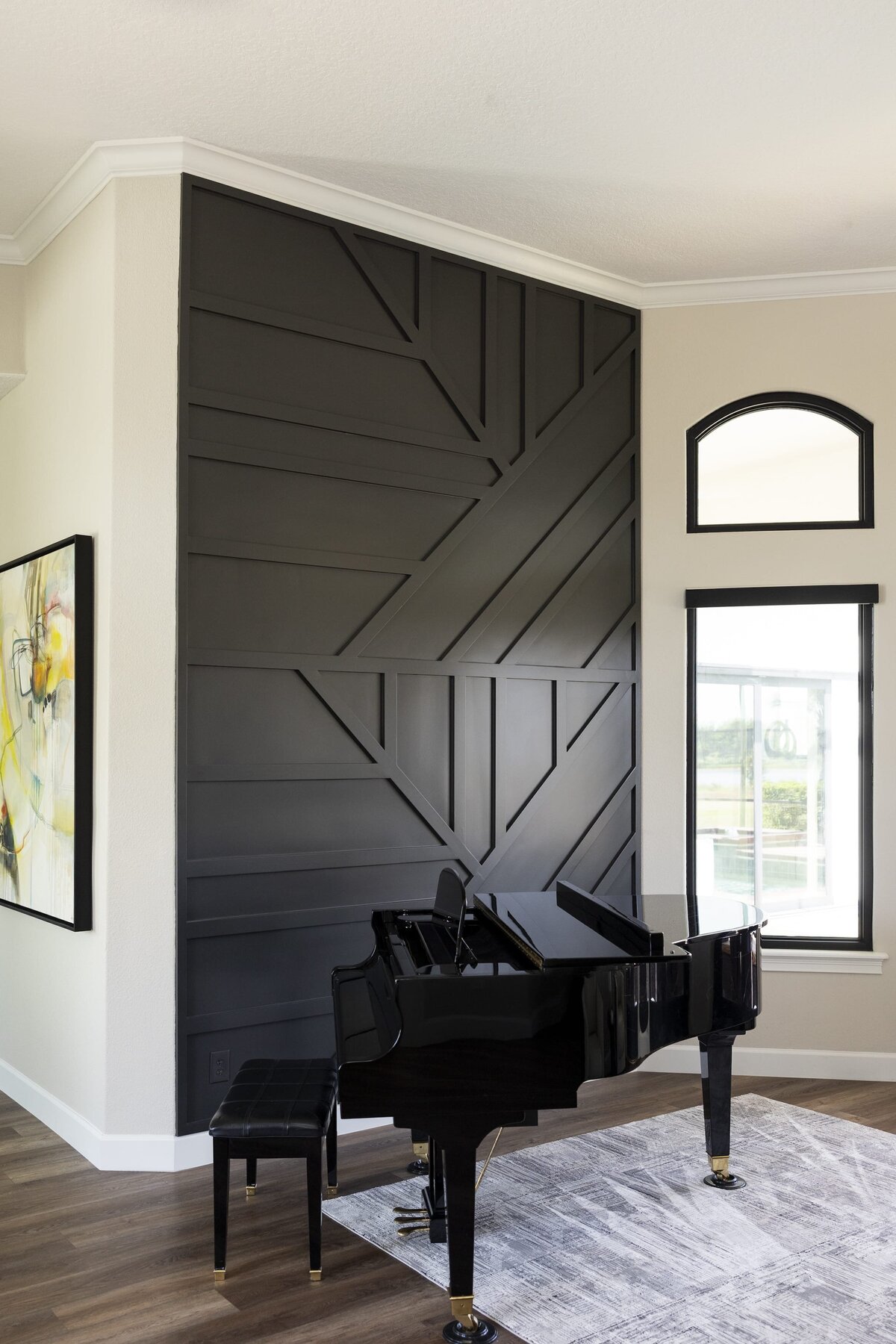 dewine design orlando interior designer windermere full home renovation black accent wall and grand piano