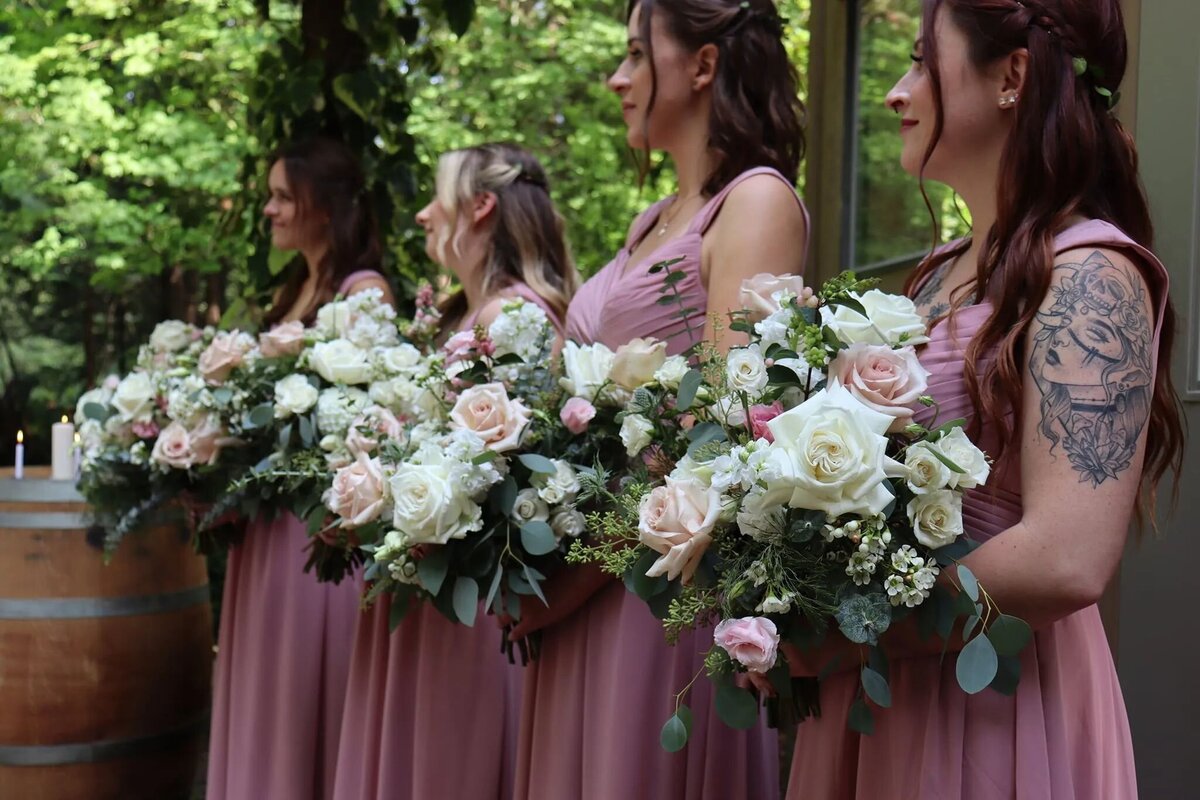 ivory and blush bridesmaid bouquets roses
