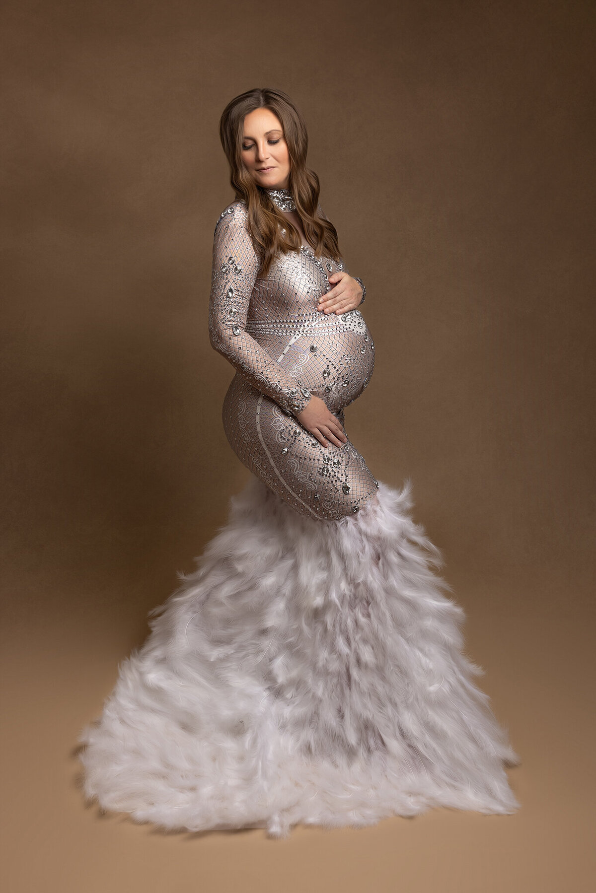 Charleston MAternity Photography with girl in feather dress with jewels