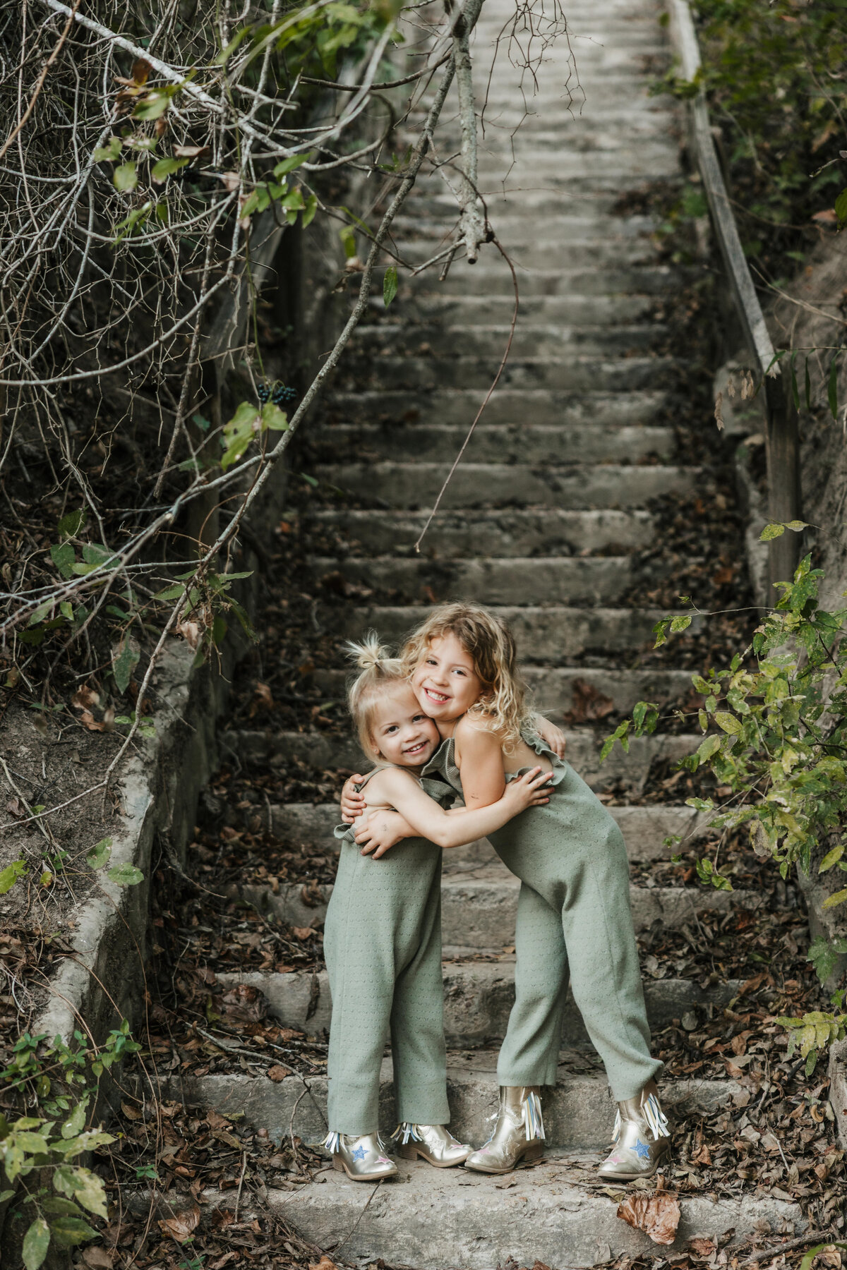 two-girls-pose-family-photos