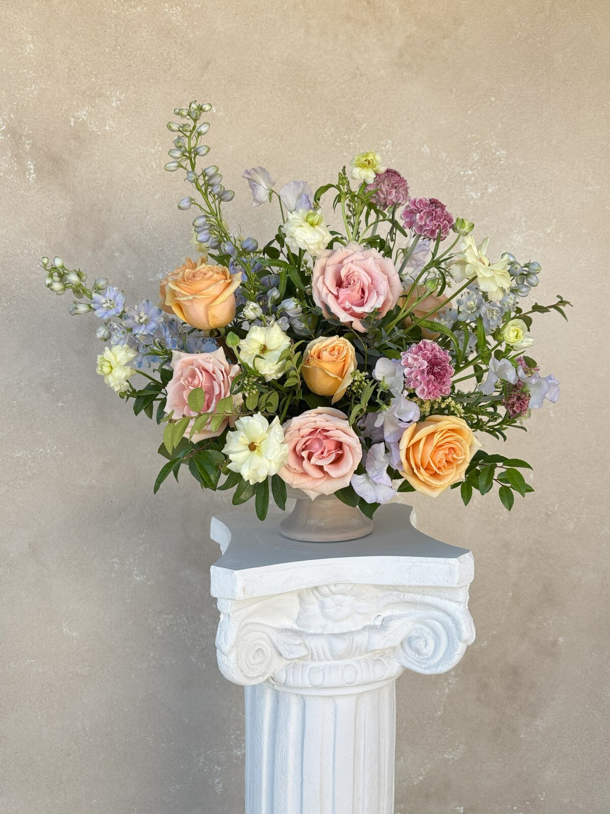 pedestal arrangement spring floral lush