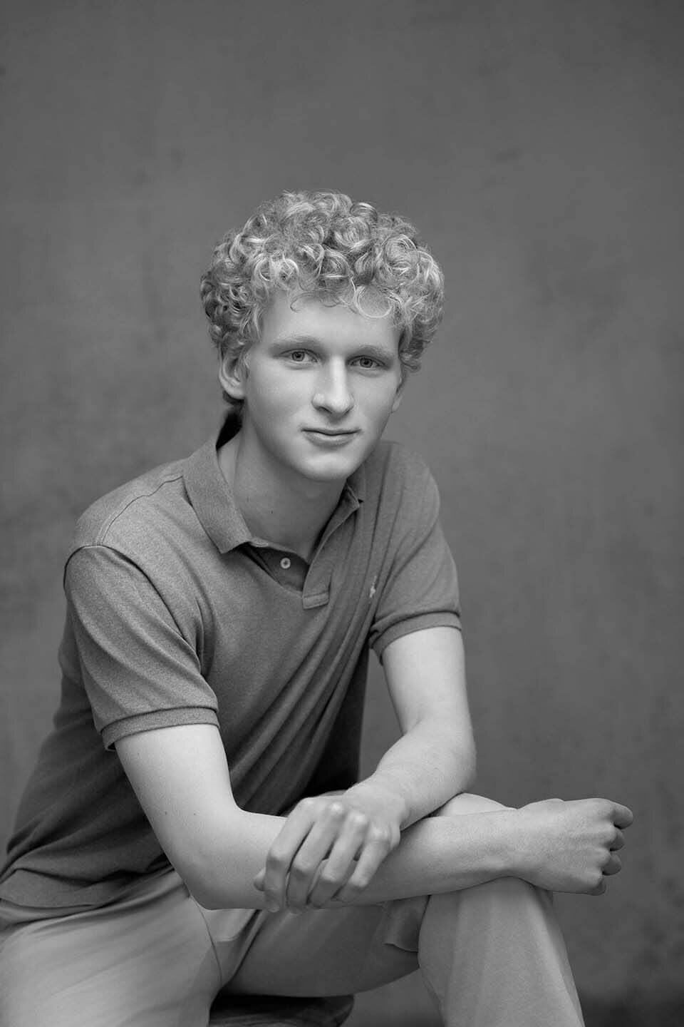 senior-boy-posed-in-studio-