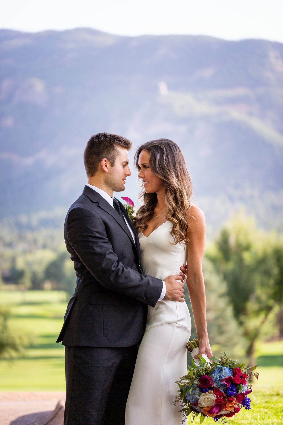 Bride and Groom Embrace at the Broadmoor