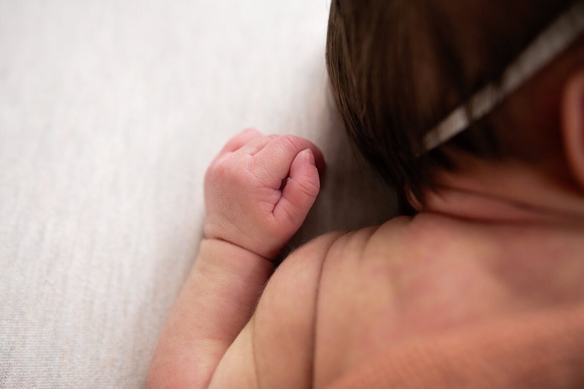 details of newborn baby, shoulders and hand
