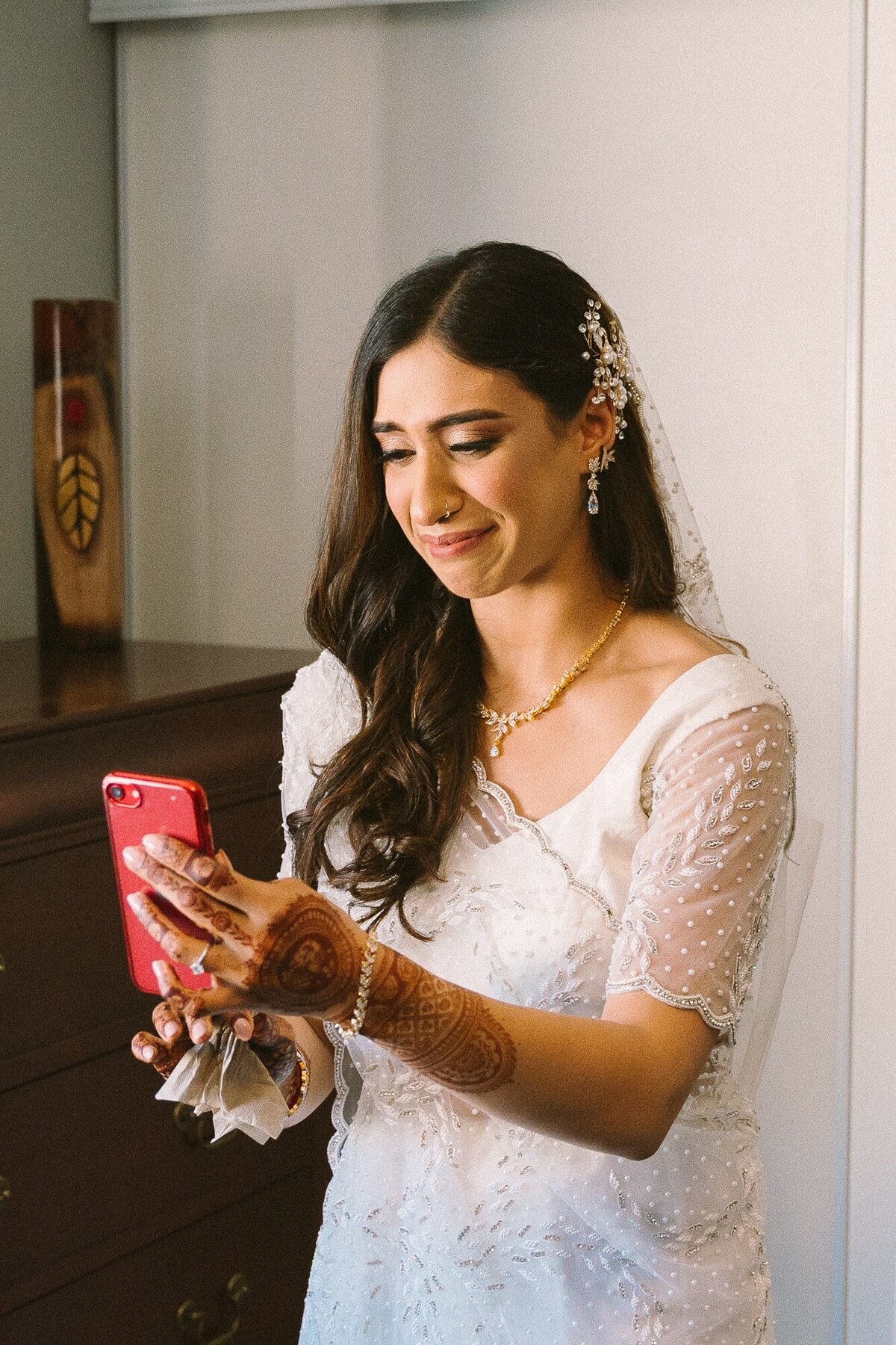 bride facetiming her parents and getting emotional
