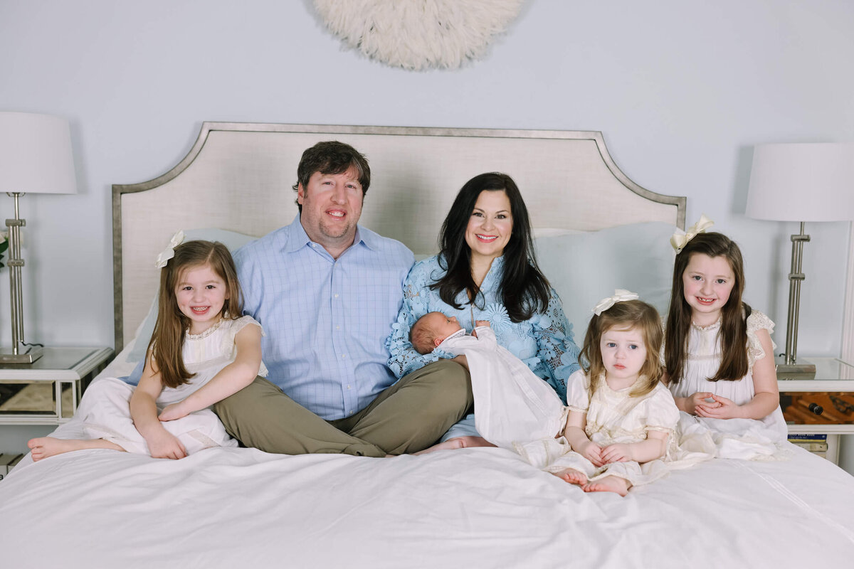 family-on-bed-with-newborn-1